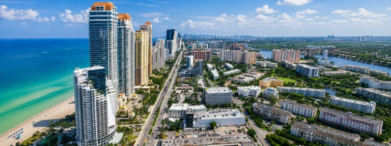 Sunny Isles home Inspection on Coastal city skyline with beach view